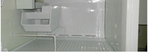 Spotless refrigerator shelf after a deep clean