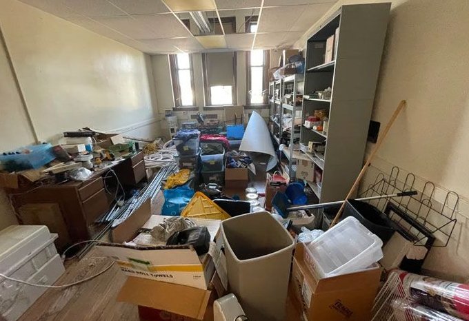 Cluttered storage room before an Amelia Shine Cleaning Services move-out clean